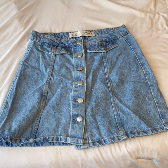 Jean mini skirt with buttons down the front. - Picture 2 of 6